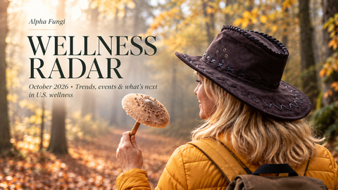 Woman in an autumn forest holding a wild mushroom, featured as editorial artwork for Alpha Fungi Wellness Radar