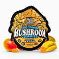 Packaging of TRE House Extra Strength Mushroom Gummies Juicy Mango flavor with mushrooms and mangoes around.