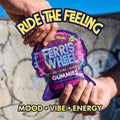 Close up of Ferris Wheel Sour Cherry gummy held in hand showing texture and size for daily mood support