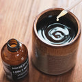 Dropper applicator and bottle cap of North Spore functional mushroom extract