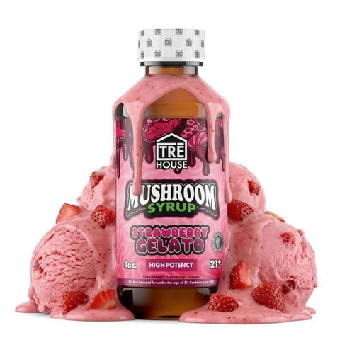 TRē House Strawberry Coast mushroom syrup bottle presented over strawberry ice cream scoops