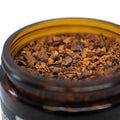 Functional adaptogenic mushroom powder mix in a wooden bowl